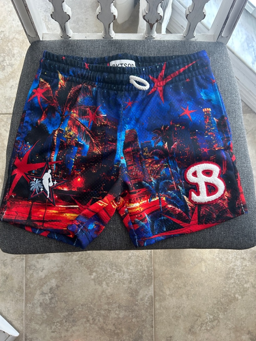 Youth Large BKTSQD (Bucketsquad) basketball shorts.